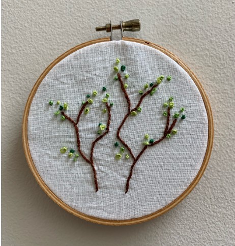 An embroidered tree by Caly McCarthy.
